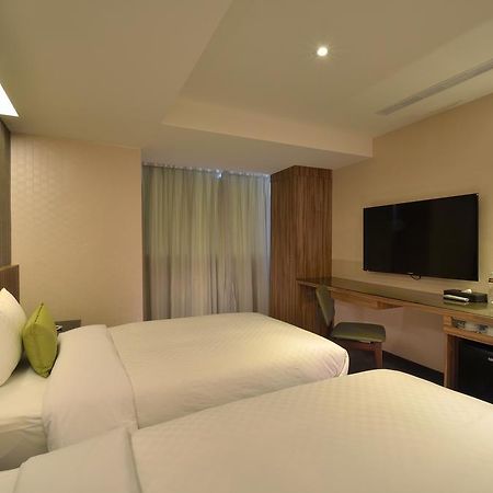 欣欣時尚旅店松山站 Taipei Quarto foto