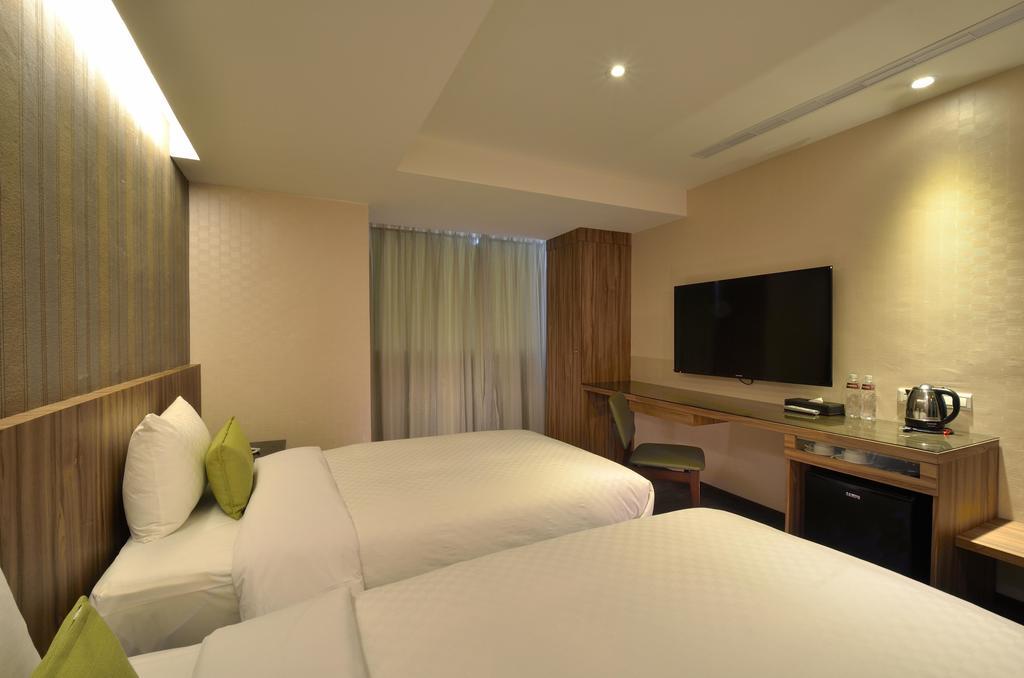 欣欣時尚旅店松山站 Taipei Quarto foto