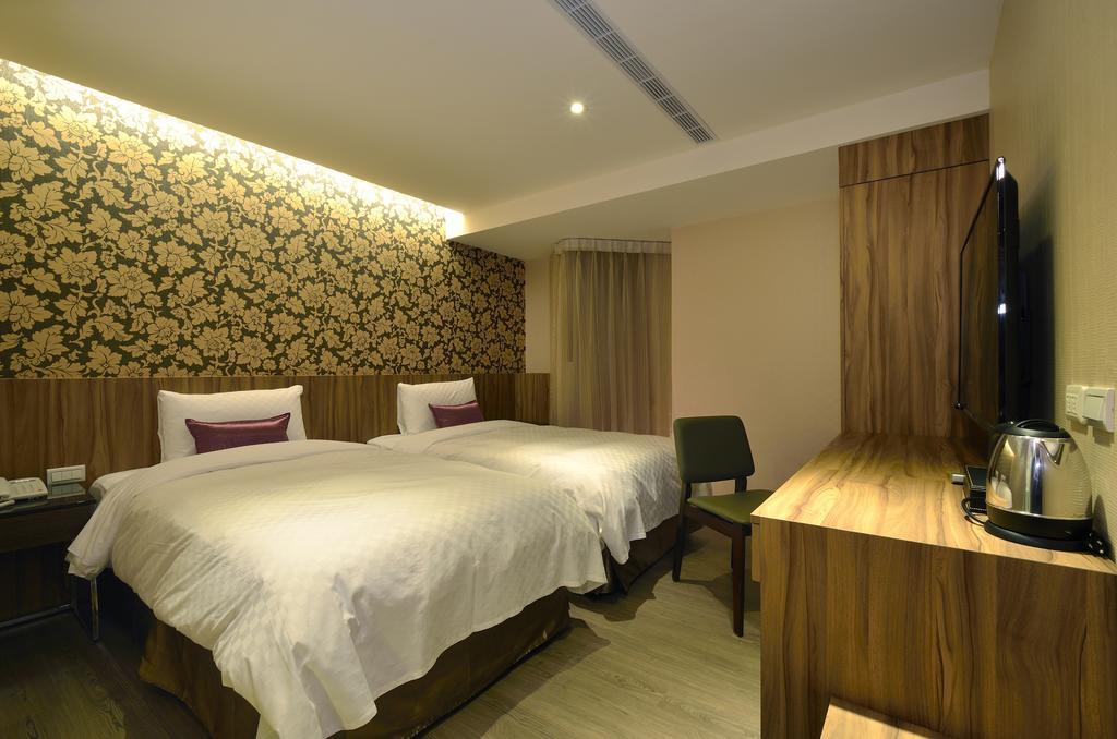欣欣時尚旅店松山站 Taipei Quarto foto