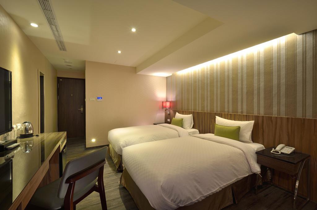 欣欣時尚旅店松山站 Taipei Quarto foto